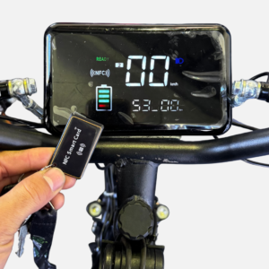Hand tapping an NFC Smart Card against the Vinxs e-bike digital display, screen showing READY and the NFC icon lit